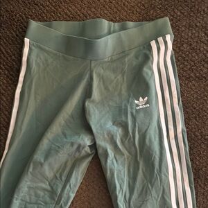 Adidas Green and White Joggers with Iconic Stripes